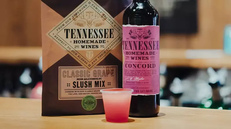 A bottle of Tennessee Homemade Wines and a slush mix packet.