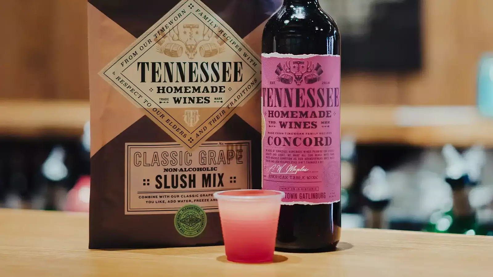 A bottle of Tennessee Homemade Wines and a slush mix packet.