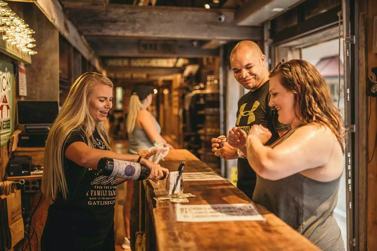 A couple tasting wines in Tennessee Homemade Wines in Gatlinburg and Pigeon Forge, Tennessee.