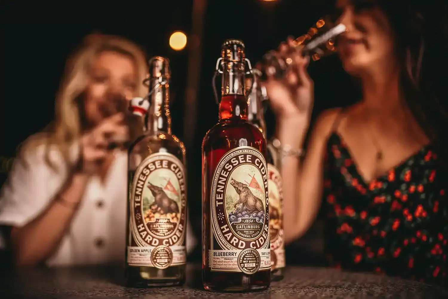 Ladies tasting Tennessee Cider Co. products in Gatlinburg, Tennessee.